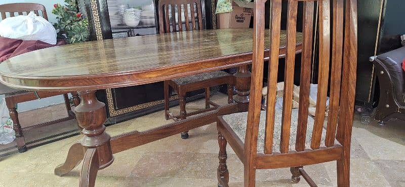 Wooden dining table with 6 foam chairs in good quality 2