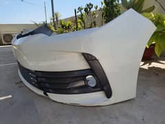Genuine Toyota Corolla Grande front and rear used bumpers
