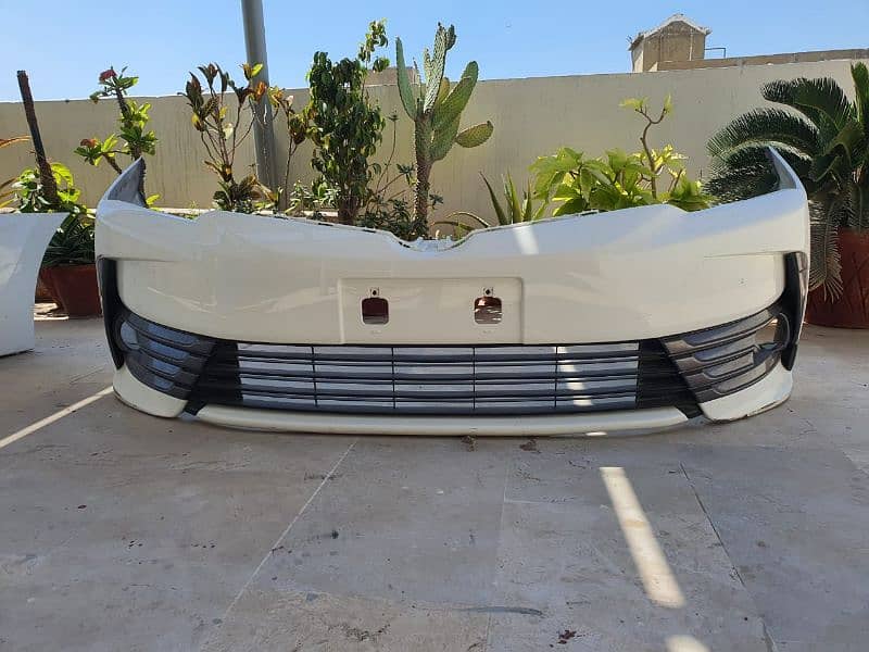 Genuine Toyota Corolla Grande front and rear used bumpers 2