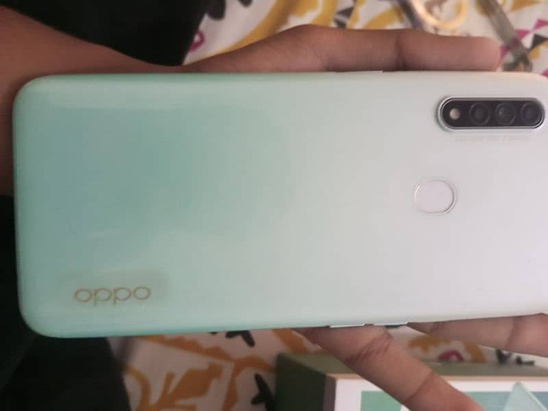 Oppo a31 4/128gb crack on sim tray and small crack on protector 5