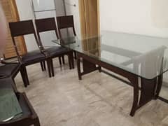 Dining table with stainless glass and six chairs 0