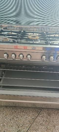 Imported Italian Cooking ranges with 5 Burners anda Baking Oven+gemini