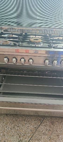 Imported Italian Cooking ranges with 5 Burners anda Baking Oven+gemini 0