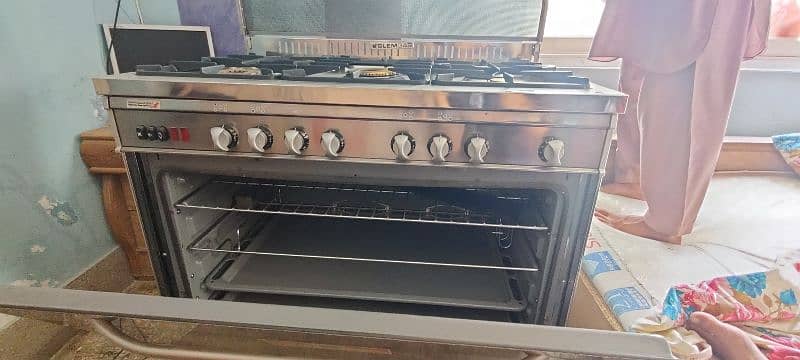 Imported Italian Cooking ranges with 5 Burners anda Baking Oven+gemini 1