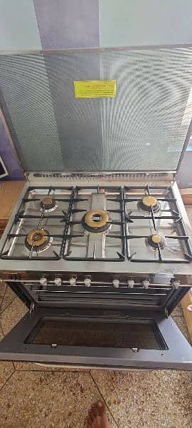 Imported Italian Cooking ranges with 5 Burners anda Baking Oven+gemini 9