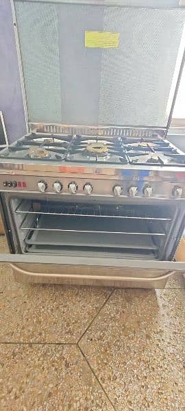 Imported Italian Cooking ranges with 5 Burners anda Baking Oven+gemini 10