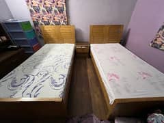 2 single bed with matteress and one side table 0