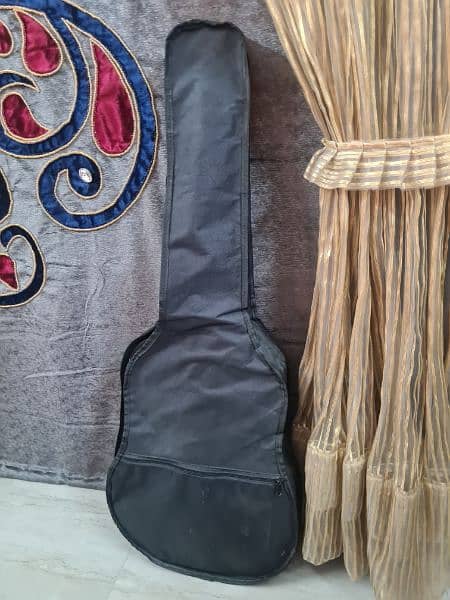 Acoustic Guitar With 2 picks , 6E strings and Bag 4