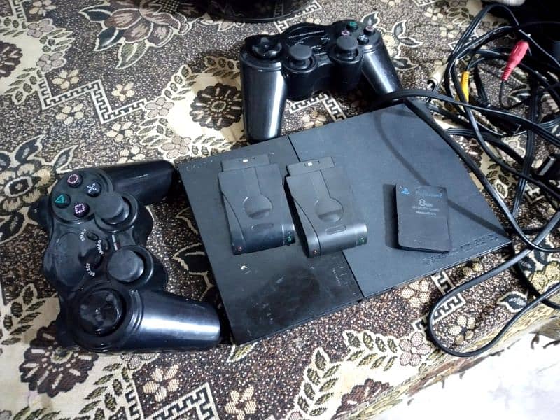 Playstation 2 with Wireless Controllers Games 2