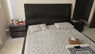 One King Size Bed, Two Side Tables, One Console