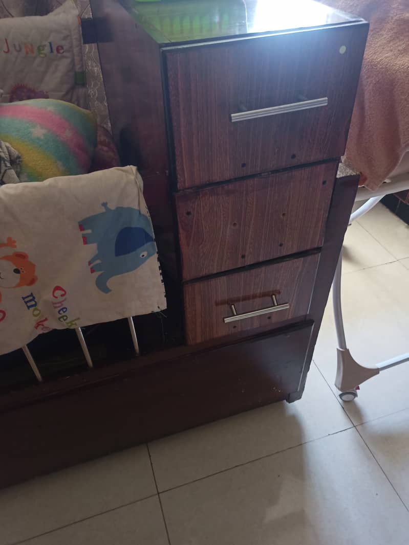 Solid wood baby cot with storage for urgent sale 2