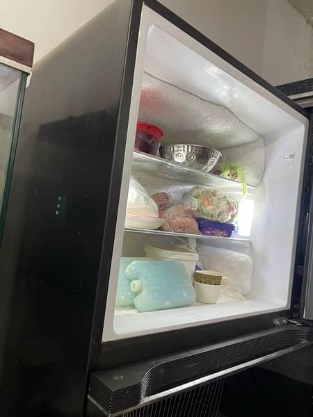 brand new condition haier refrigerator green color medium size 3