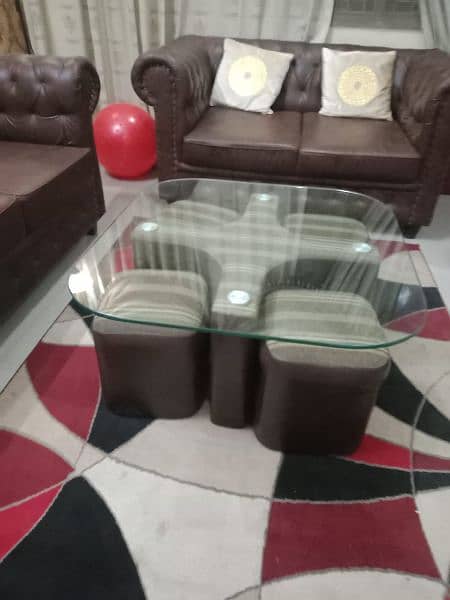 Leather seven seater sofa set including center table 1