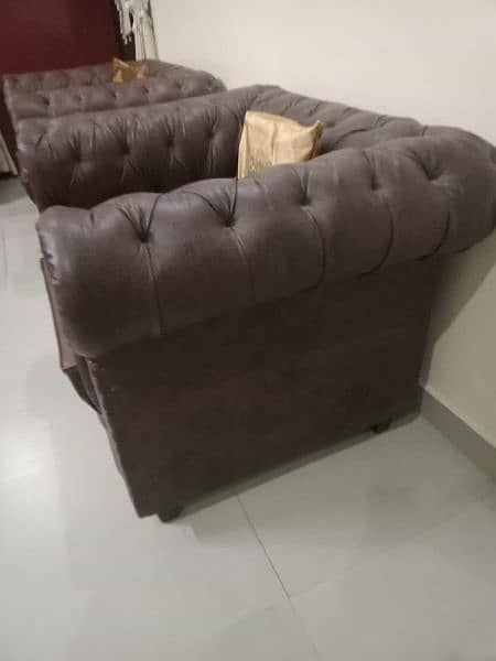 Leather seven seater sofa set including center table 6