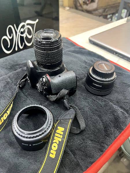 Nikon d5300 with kit lens and yougno lens 50mm 5
