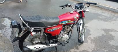 Honda 125 red colour 0