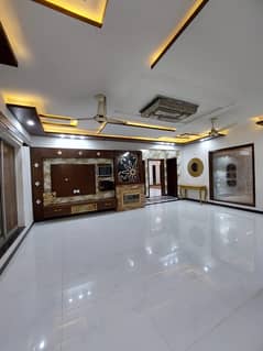 FAISAL TOWN BRAND NEW TEN MARLA DOUBLE STORIES BEAUTIFUL HOUSE FOR SALE IDEAL LOCATION NEAR MAIN ROAD