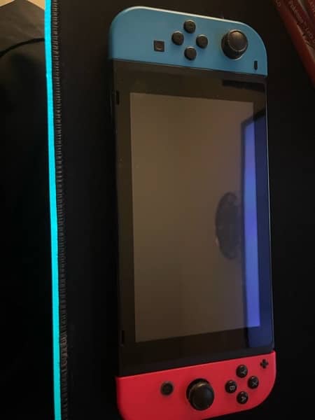 Nintendo switch with 3 games 1