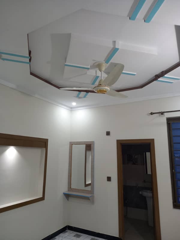 5 Marla UPper POrtion Available for Rent With Only Electricity Water Tanker and Gas Cylinder on Prime Location of Airport Housing Society Near Gulzare quid and Express Highway 9