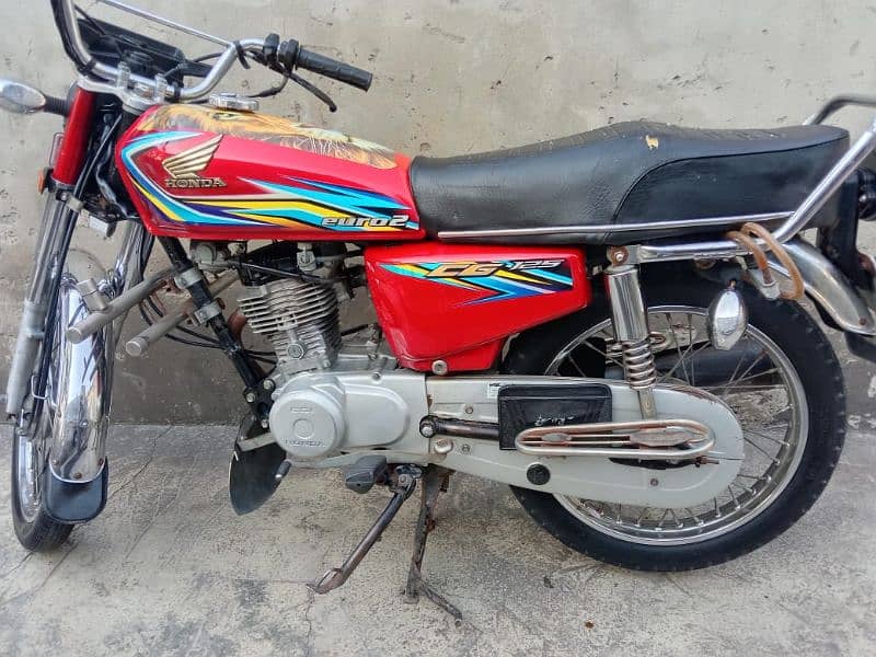 Honda 125 red 4