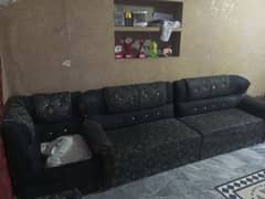 black color SOFA and one table without glass