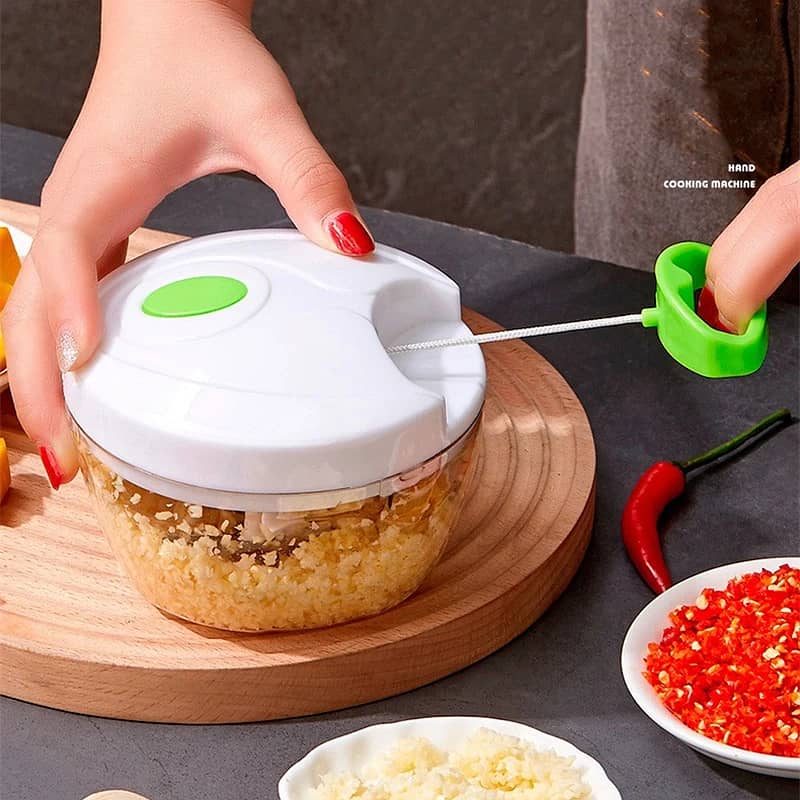Easy Spin Cutter And Chopper Kitchen Tool 7