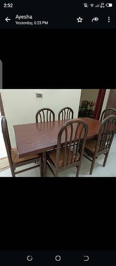 Dinner table along with 6 chairs