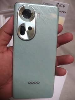 oppo reno 11 mobile with 12/256 new ph want to sale 0