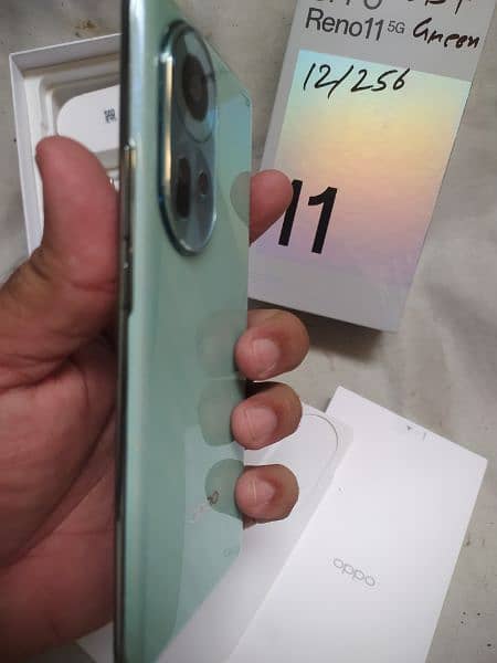 oppo reno 11 mobile with 12/256 new ph want to sale 1