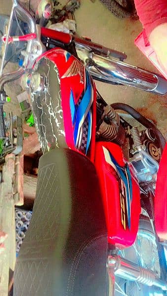 red colour Honda 125cc 1