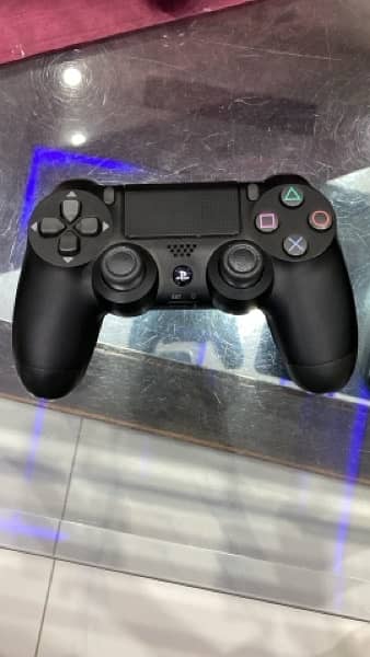 Ps4 slim 1tb ( brand new condition ) with 2 controllers and 2 games 2