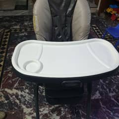 Baby high chair plus baby car booster 2 in 1 by Graco