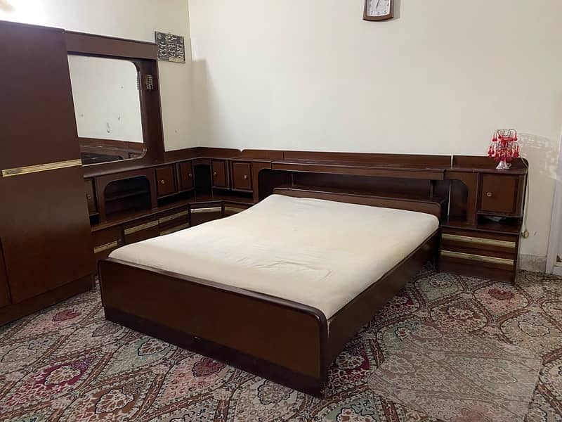 Bed set including king bed 3 side tables, dressing table and cupboard 2