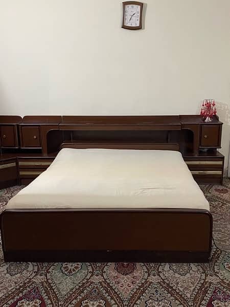 Bed set including king bed 3 side tables, dressing table and cupboard 4