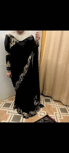 black saree with golden embroidery