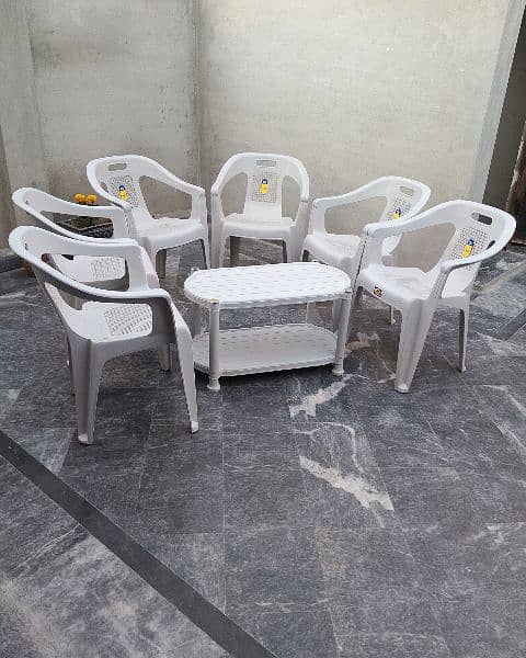 Plastic 6 Chairs 1 double shelf table 18