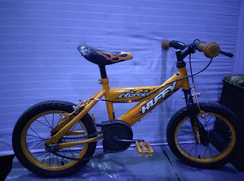 original Huffy imported cycle orange. . for age 7-10 0