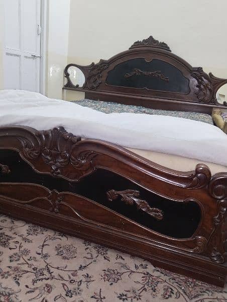 wooden bed  with tow side table and dressing table 0