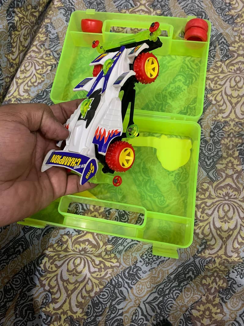 Get the 4WD Speed Racing Mini 4WD Action Car Toy for just 1050 PKR! 3