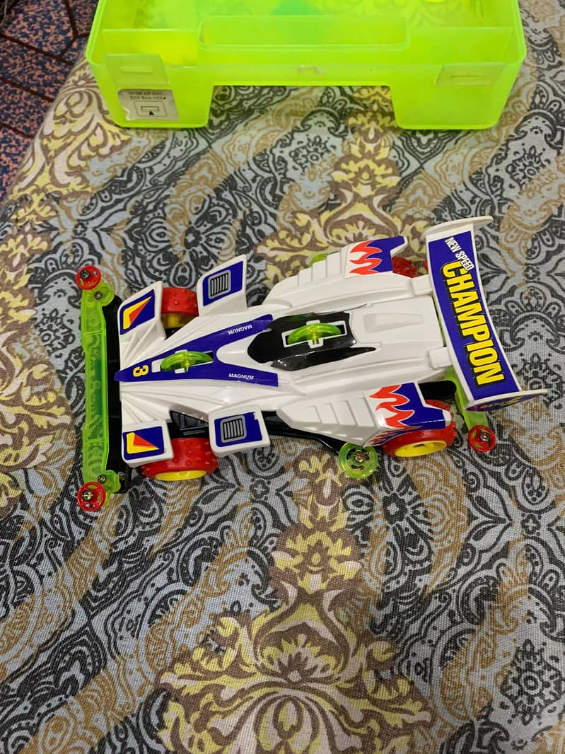 Get the 4WD Speed Racing Mini 4WD Action Car Toy for just 1050 PKR! 5