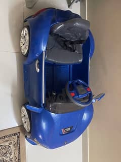 kids charging battery car with remote