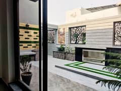 10 marla house for sale in Dha rabbar main defence road lhr 0