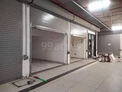 COMMERCIAL SHOP FOR SALE WITH GLASS DOOR ALLIANCE ON 100FT MAIN ROAD PRIME LOCATION OF NORTH KARACHI 11C