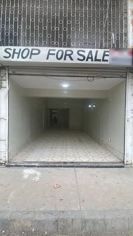 COMMERCIAL SHOP FOR SALE WITH GLASS DOOR ALLIANCE ON 100FT MAIN ROAD PRIME LOCATION OF NORTH KARACHI 11C 3