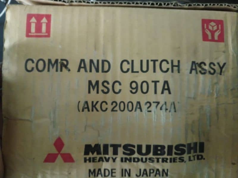 original mitsubishi AC compressor plus condenser grill with fan 0