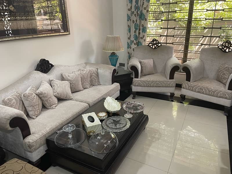 Sofa set with book shaped table and side tables 1