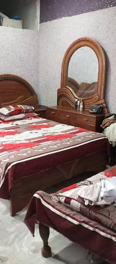 double bed spring matress and dressing table for sale . 55k only