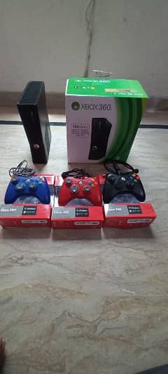 xbox 360 with games and 3 coloured controler just 1 month used 0