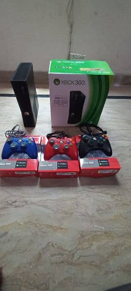 xbox 360 with games and 3 coloured controler just 1 month used 1