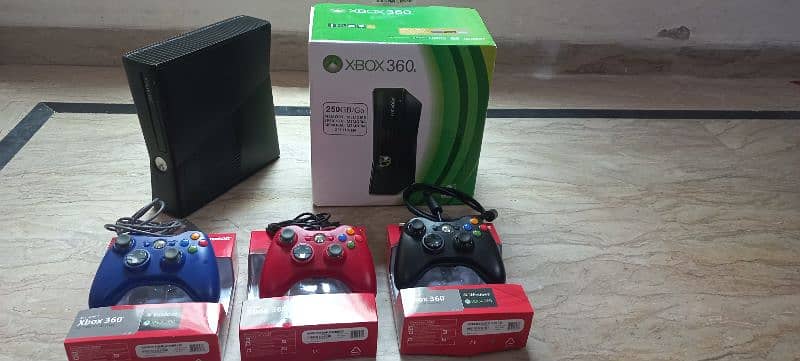 xbox 360 with games and 3 coloured controler just 1 month used 5